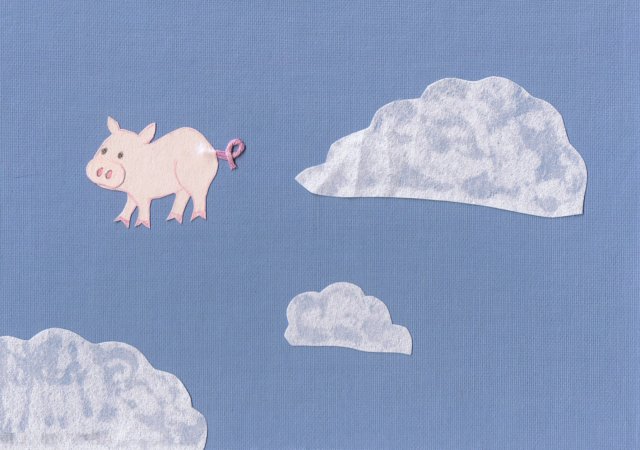 flying pig light blue sky background with white paper clouds and a pink paper pig with an embroidery floss tail